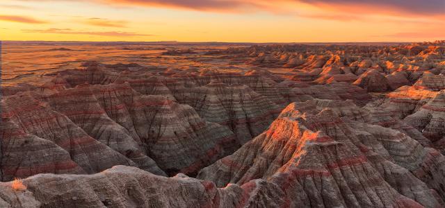 The Sun Rises Over Badlands National Park, South Dakota